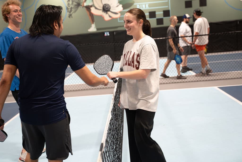 Corporate team-building event on a pickleball court