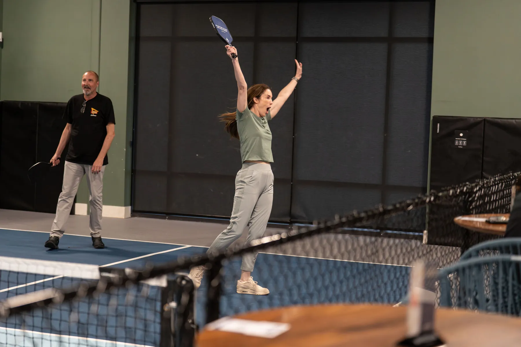 Group celebrating at a pickleball event