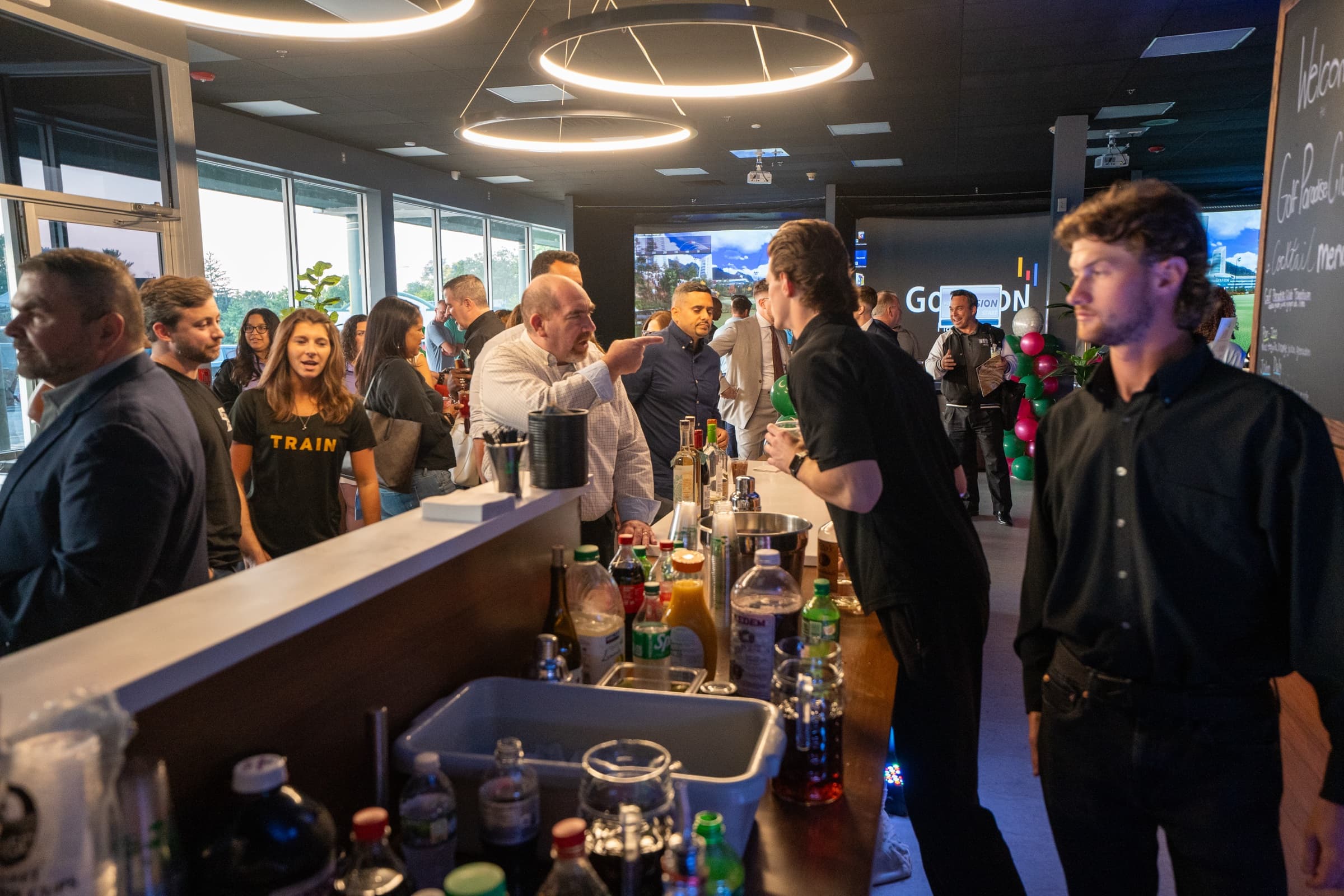A private event filling the bar at Golf Paradise Club